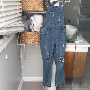 Ripped overalls.